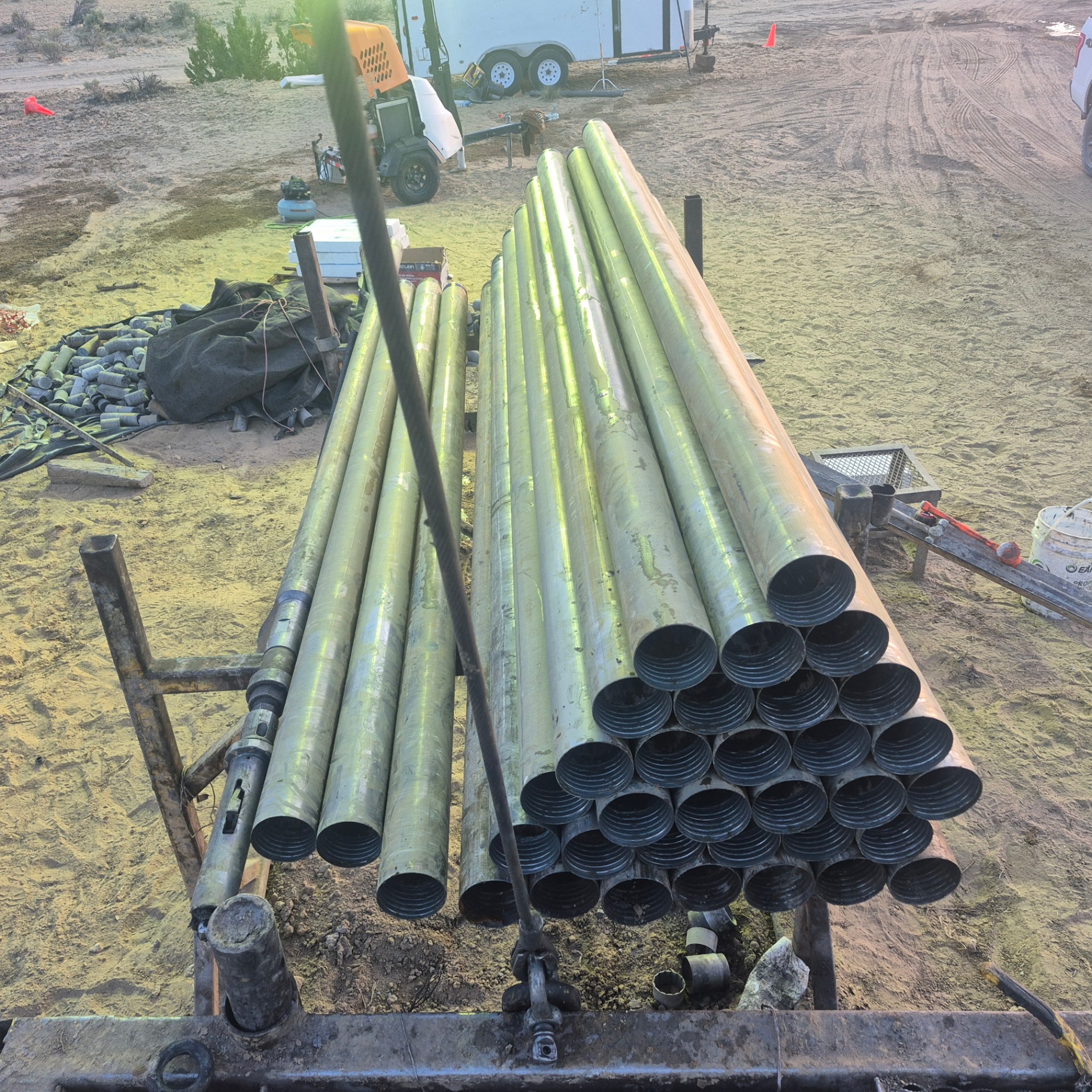 Racked HQ drill rod ready for the next hole