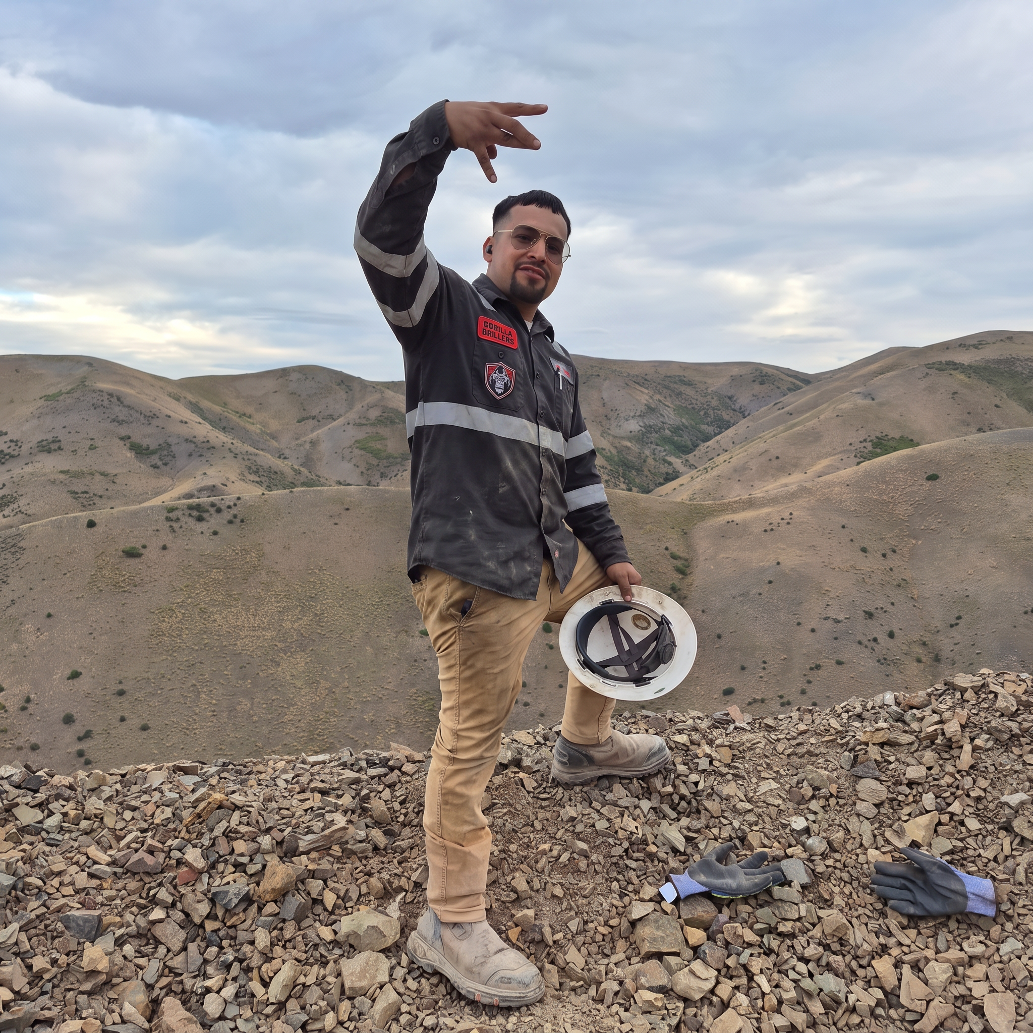 Chris A., Gorilla Drillers driller, on a Nevada ridge pad in company uniform